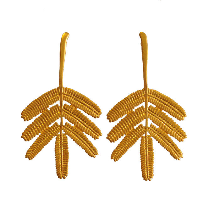 Dividivi branch earrings 24K gold or silver plated — handcrafted Colombian jewelry by Blumart inspired by the elegance and strength of nature