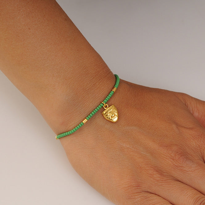 Mini Green Czech Beads Bracelet with Quimbaya Humanoid Face Charm