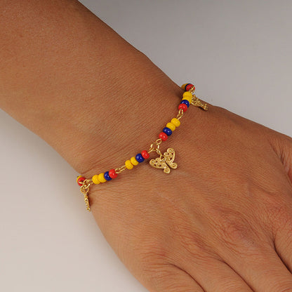 COLOMBIA BRACELET WITH MINI TAIRONA BUTTERFLY NOSE ORNAMENT CHARM